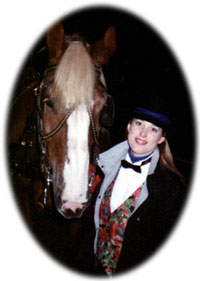 headshot of Belgian draft horse and carriage driver